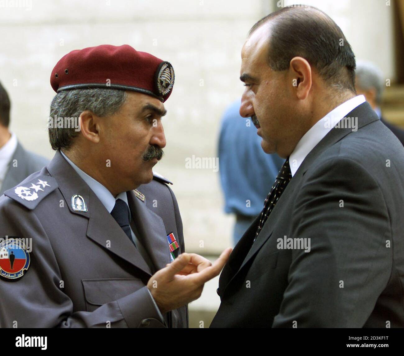 File photo of Ali Hajj, ex-head of police speaking with Mustafa Hamdan,  chief of the Republican Guard in Beirut. Ali Hajj (L), ex-head of police,  speaks with the chief of the Republican