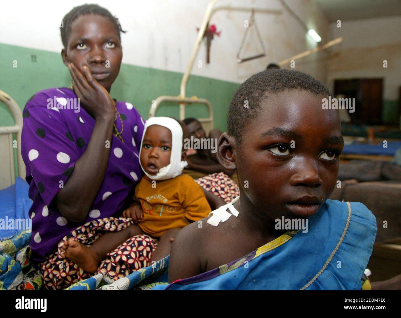 A Woman And Her Two Children Sit In A Hospital In Drodro 80 Km From Bunia Congo Nursing Their Machete Wounds April 8 03 U N Investigators Say Witnesses Reported Nearly 1 000 People A Woman And Her Two Children Sit In A Hospital In Drodro 80 Km From Bunia Congo Nursing Their Machete Wounds April 8 03 U N Investigators Say Witnesses Reported Nearly 1 000 People