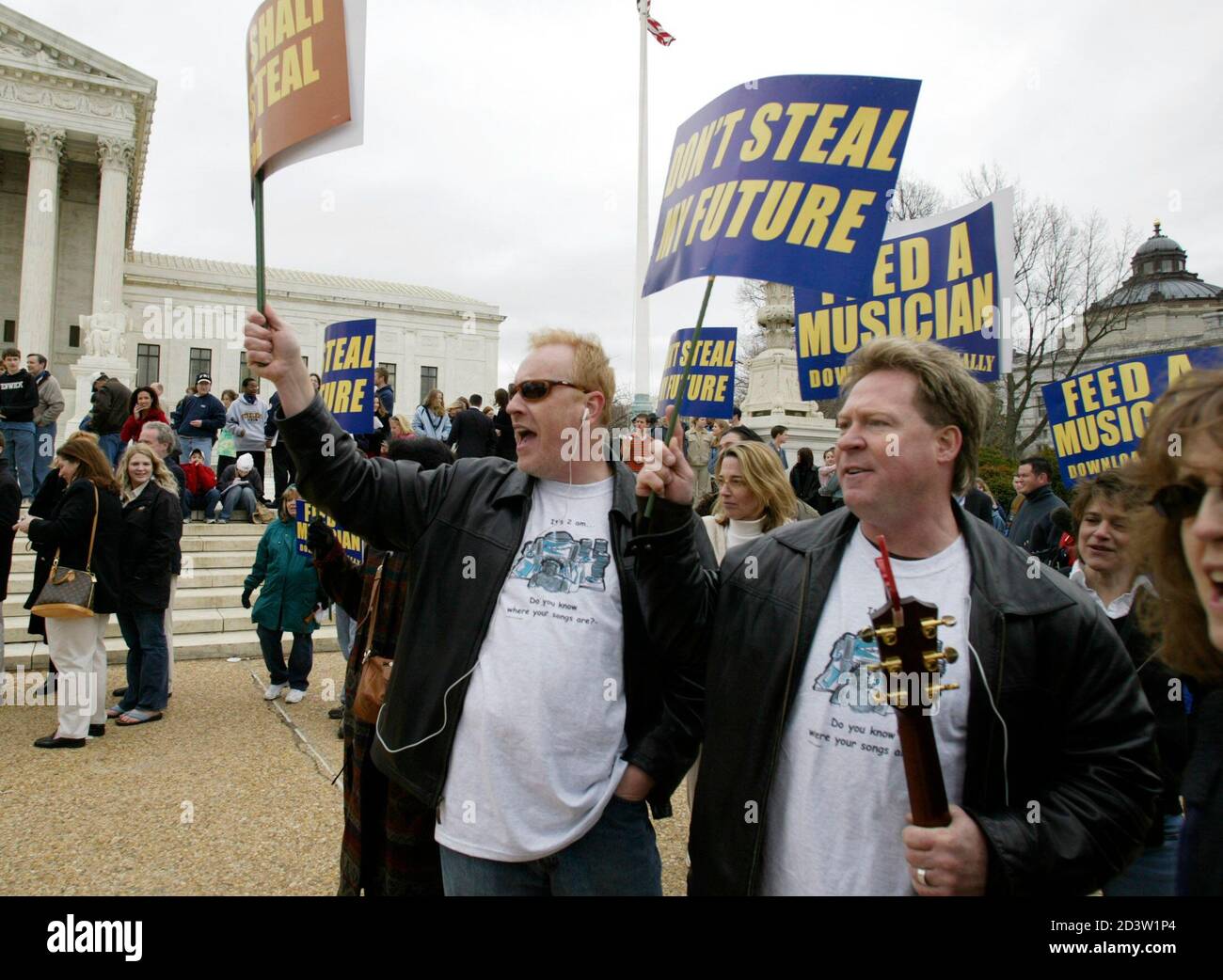 Songwriter Chip Davis (C) from Tennessee demonstrates outside ...