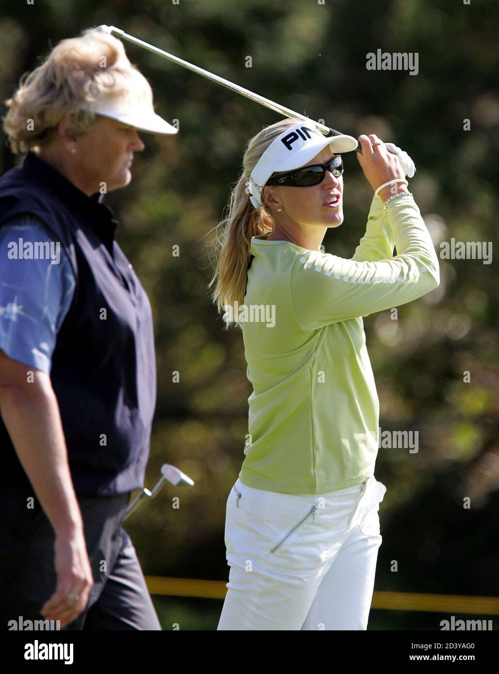 Koch Of Sweden Watches Her Drive As Davies Of England Looks On On The 7th Hole During The First Round Of The Cj Nine Bridges Classic In Cheju Island Carin Koch R