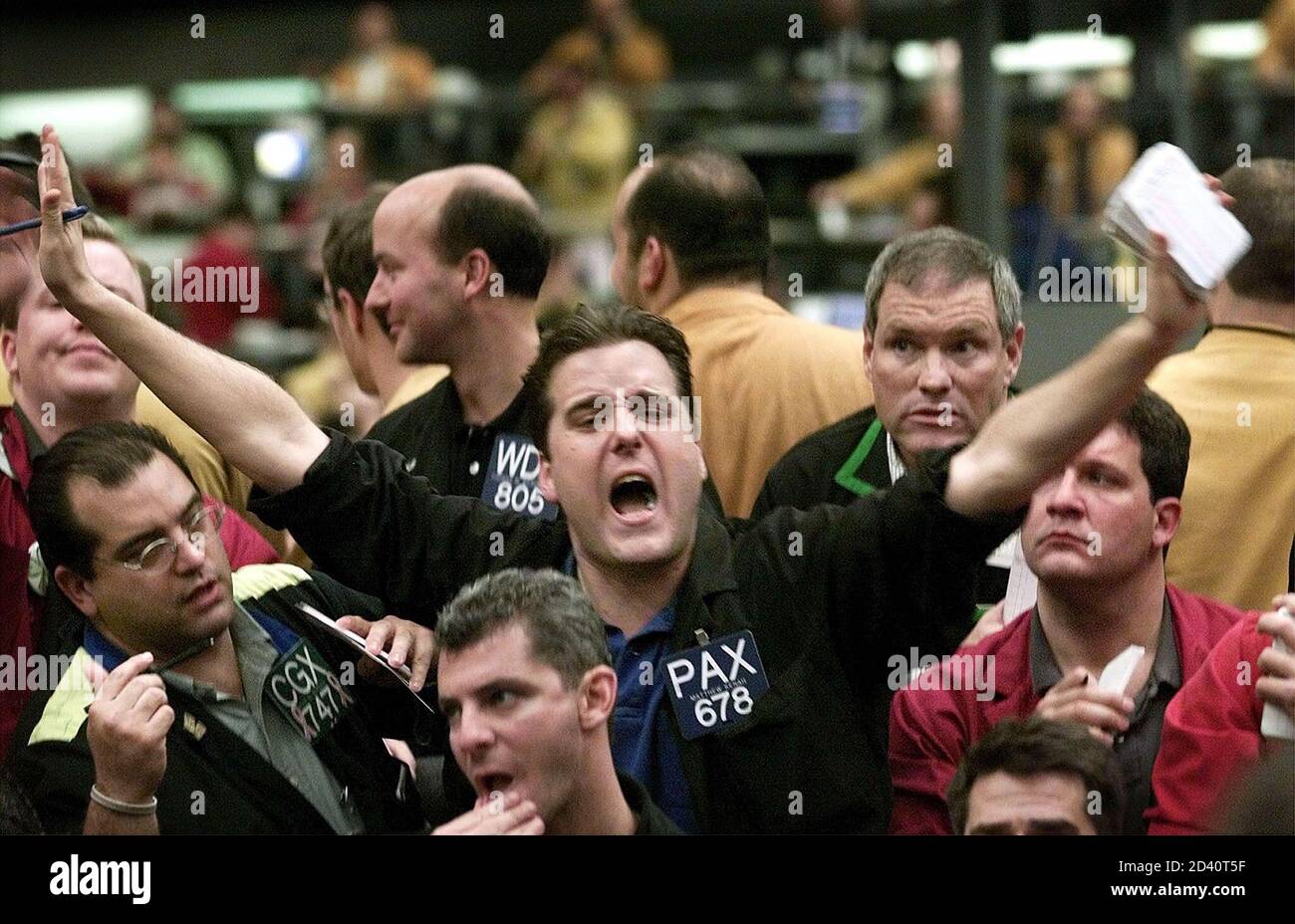 Arthur Kenah signals an offer near the close of trading in ...