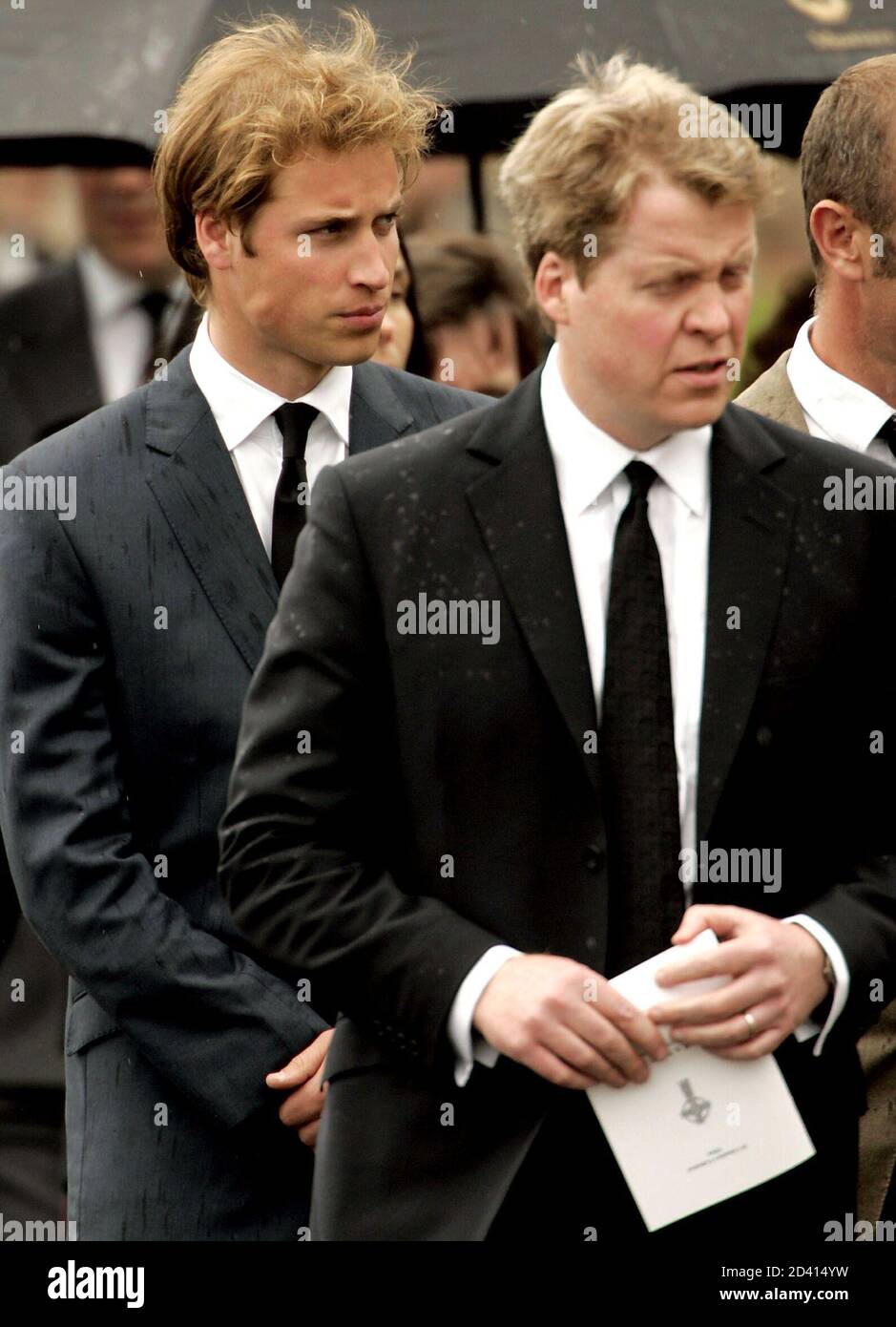 Britain's Prince William (L) and his uncle Earl Spencer (R) leave St  Columba's Cathedral after the funeral of Frances Shand Kydd in Oban in  Scotland, June 10, 2004. [Shand Kydd, mother of