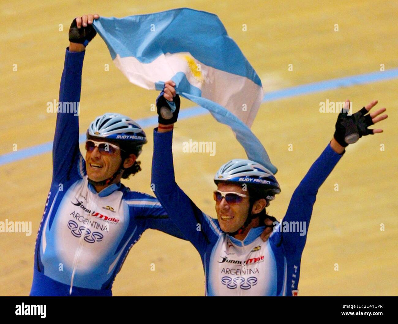 ARGENTINIAN TEAM CELEBRATE WINNING THE MEN'S 50KM MADISON FINAL AT THE  WORLD CHAMPIONSHIPS IN MELBOURNE. Argentina's Juan Esteban Curuchet (L) and  Walter Perez celebrate winning the men's 50 km Madison at the