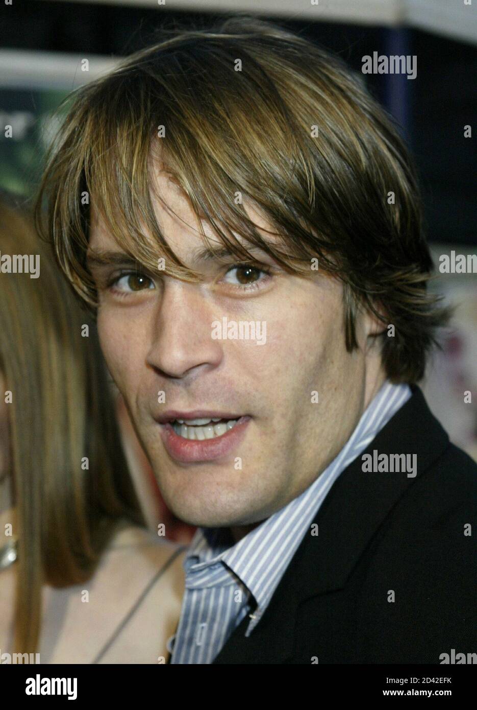 Actor Samuel Ball One Of The Stars Of The Comedy Film 13 Going On 30 Poses As He Arrives For The Film S Premiere In Los Angeles April 14 04 The Film Stars