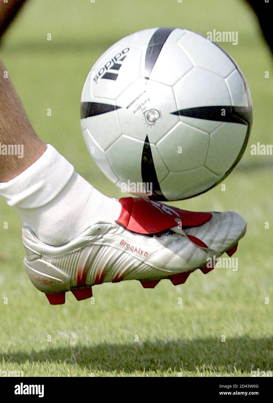 ENGLAND CAPTAIN BECKHAM CONTROLS THE BALL WITH HIS SON'S NAME ON HIS BOOT  DURING A PRACTICE SESSION AT THE NATIONAL STADIUM IN LISBON. England  captain David Beckham controls the ball as he