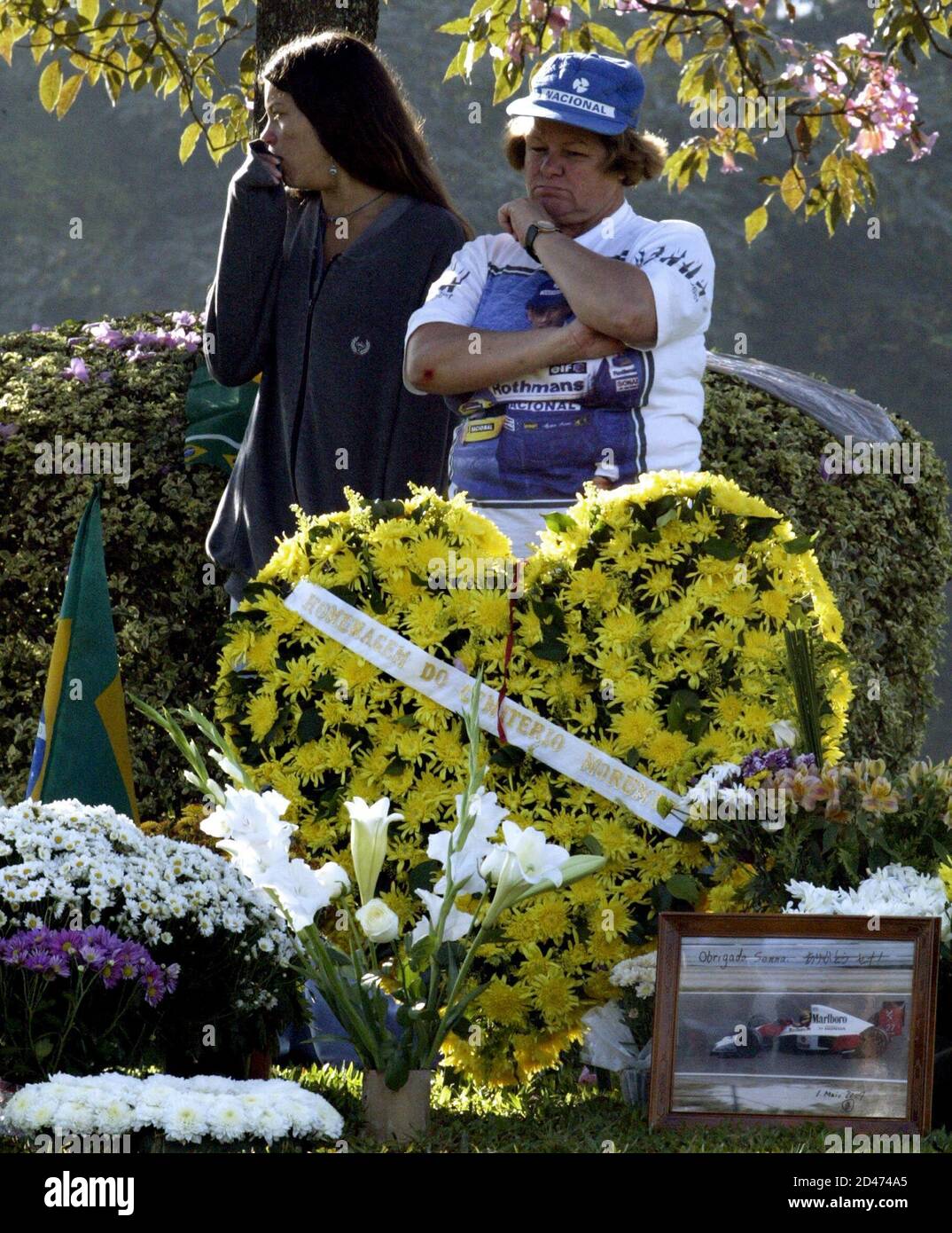 Fans Of Brazilian Formula One Driver Ayrton Senna Pray And Pay Tribute At His Grave Site In The Morumbi Cemetery In Sao Paulo May 1 04 Senna Died Ten Years Ago Following
