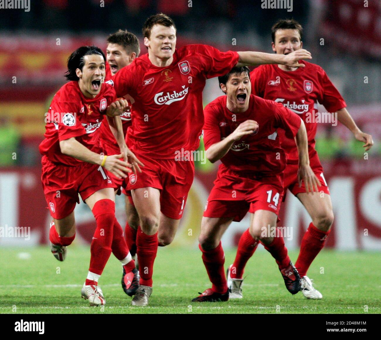 Liverpool S Team Runs On The Pitch To Celebrate Victory Over Ac Milan After Winning The Champions League Final In Istanbul Liverpool S Team L R Luis Garcia Steven Gerrard John Arne Riise Xabi Alonso