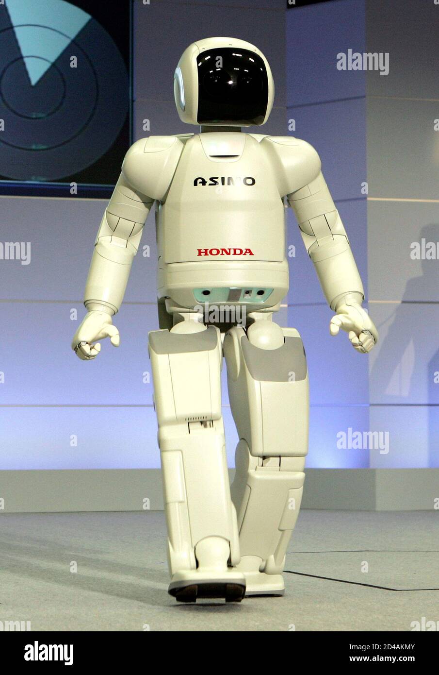 Honda Motor S Humanoid Robot Next Generation Asimo Is Unveiled At Honda S Office In Wako North Of Tokyo December 15 04 Honda Motor Corp Announced The Development Of New Technologies For The Next Generation Asimo 130cm