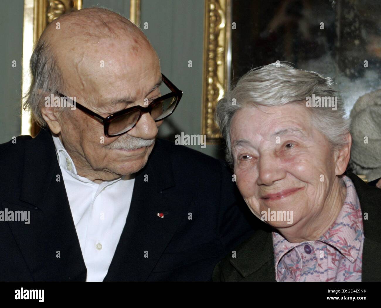 Argentine writer Sabato talks with French nun Pierron after she was awarded  the Legion d' Honnoeur at the French embassy in Buenos Aires. Argentine  writer Ernesto Sabato (L) talks with 76-year-old French