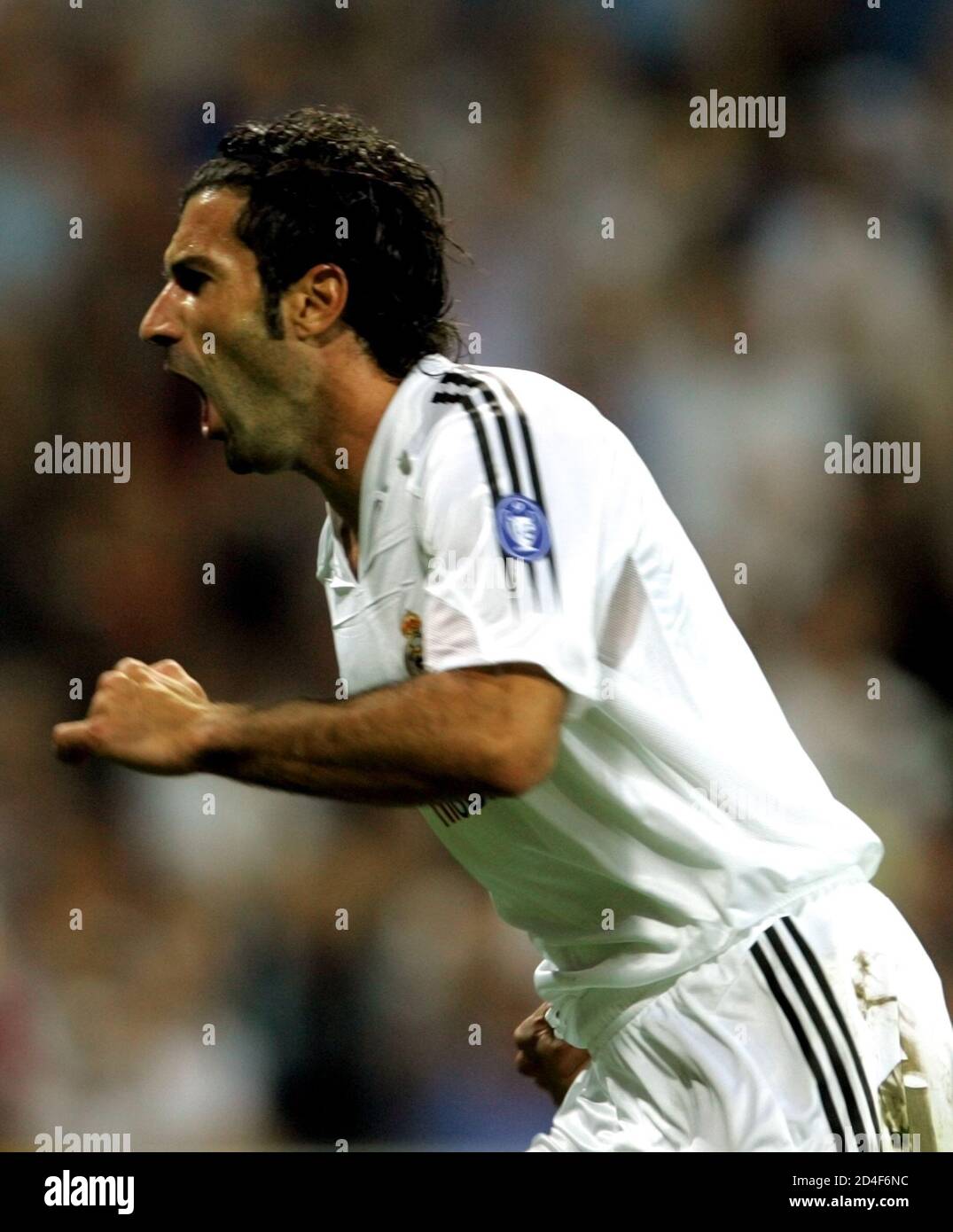 Real Madrid S Portuguese Figo Celebrates Goal Against As Roma During Their Champions League Group B Soccer Match In Madrid Real Madrid S Luis Figo Runs In Celebration After Scoring A Goal From The
