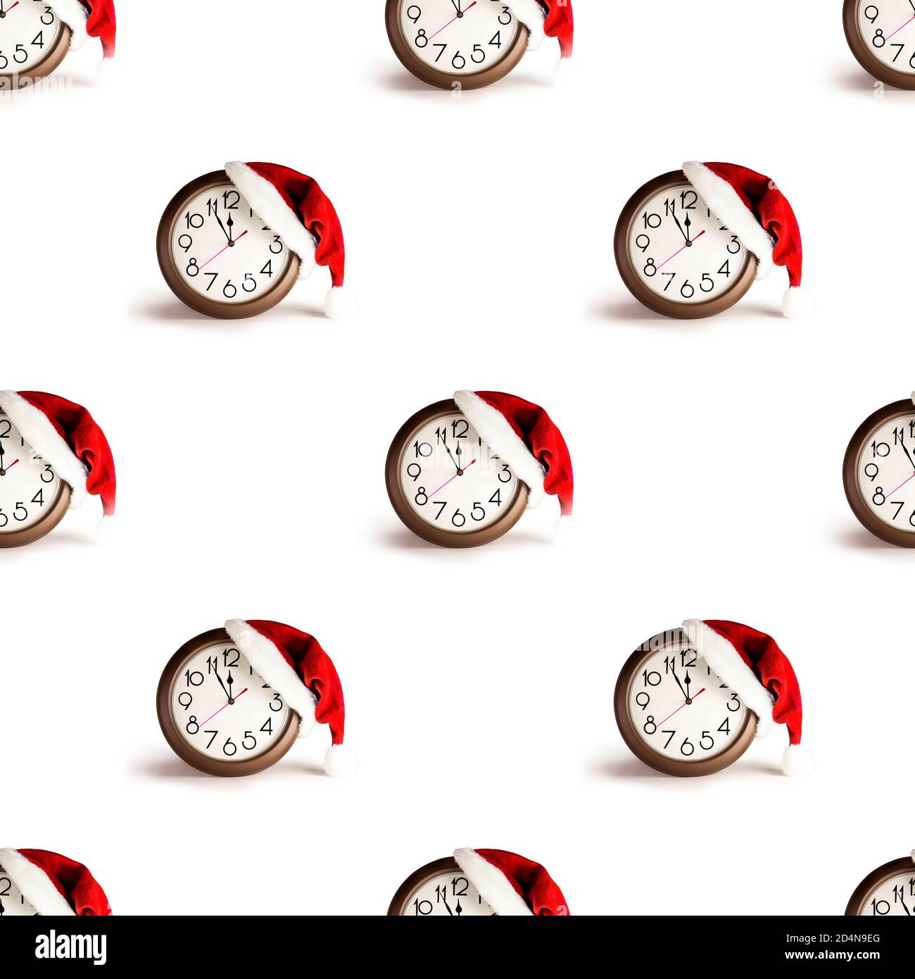 Chapeau de père noël sans coutures sur la montre. Concept de Noël, minimalisme Banque D'Images