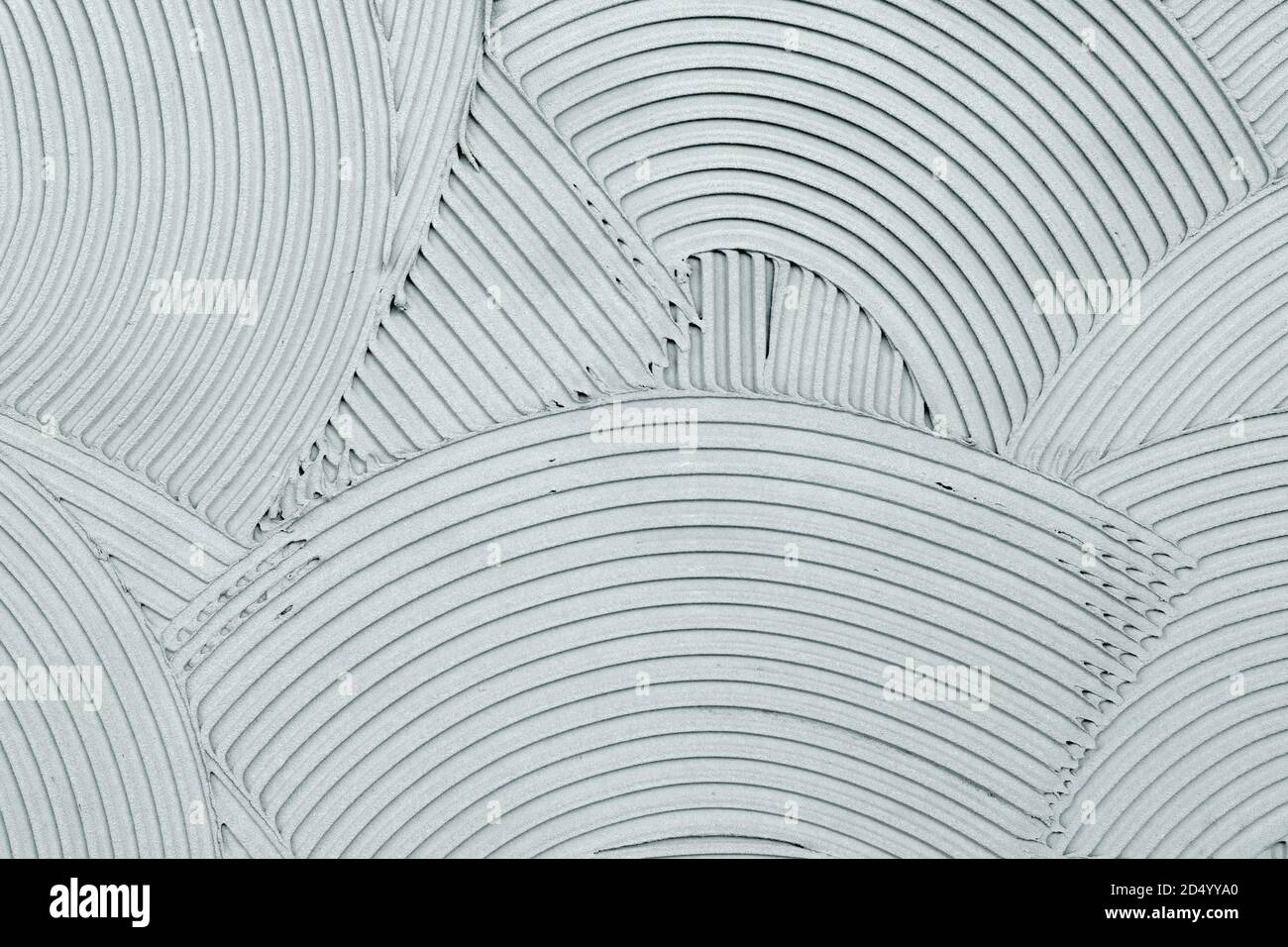 Finition murale en plâtre décoratif, texture ondulée moderne urbaine de fond de cercles concentriques qui se chevauchent Banque D'Images