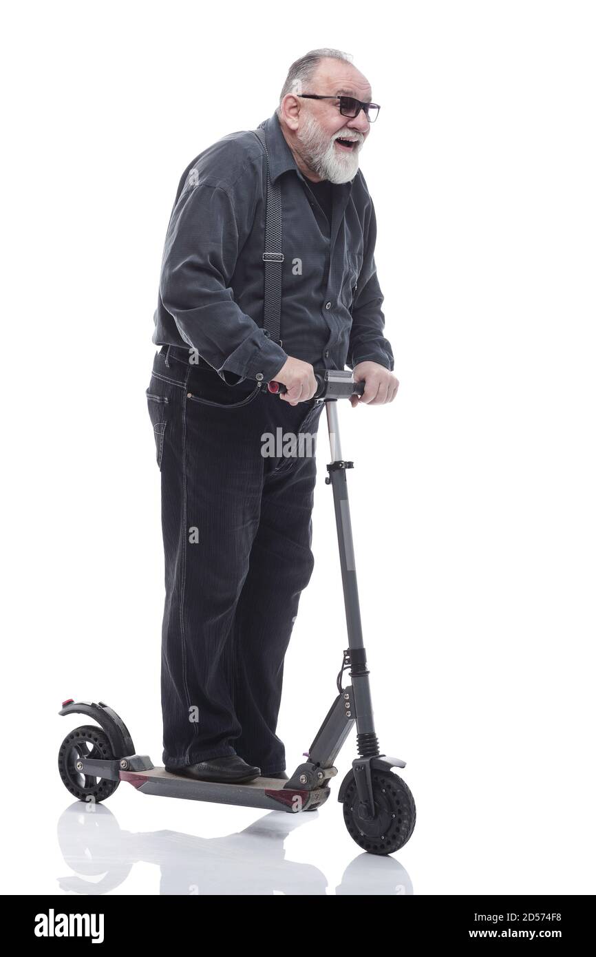 en pleine croissance. un homme âgé avec un scooter électrique Banque D'Images