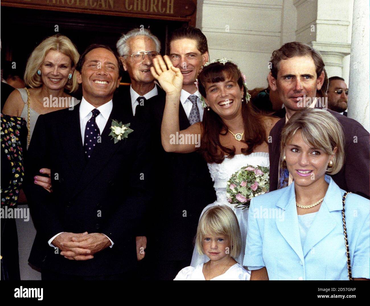 Swiss cycle racer Muller (C) poses with his wife Alexandra Anka