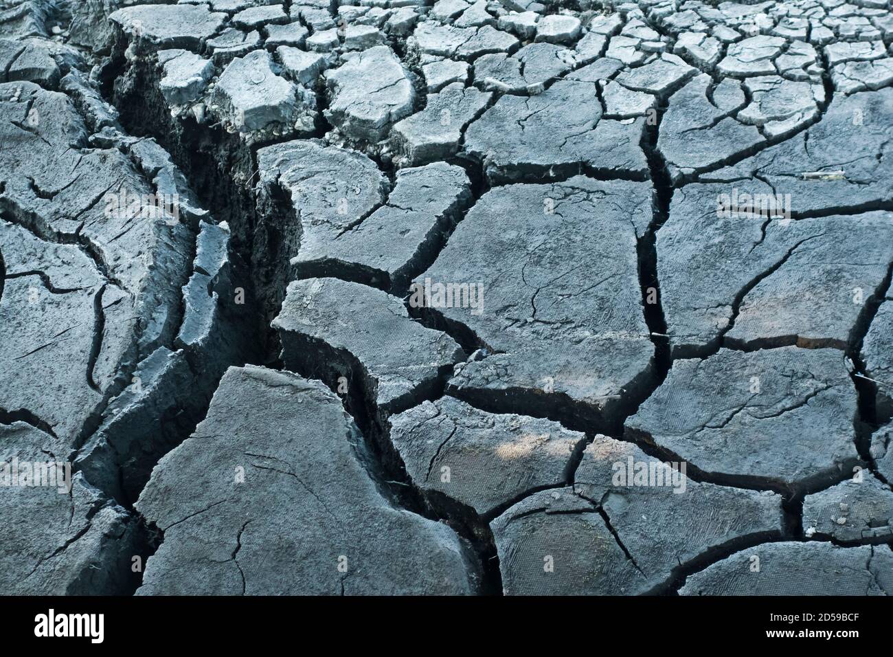 un sol extrêmement sec est brisé comme concept de réchauffement de la planète Banque D'Images