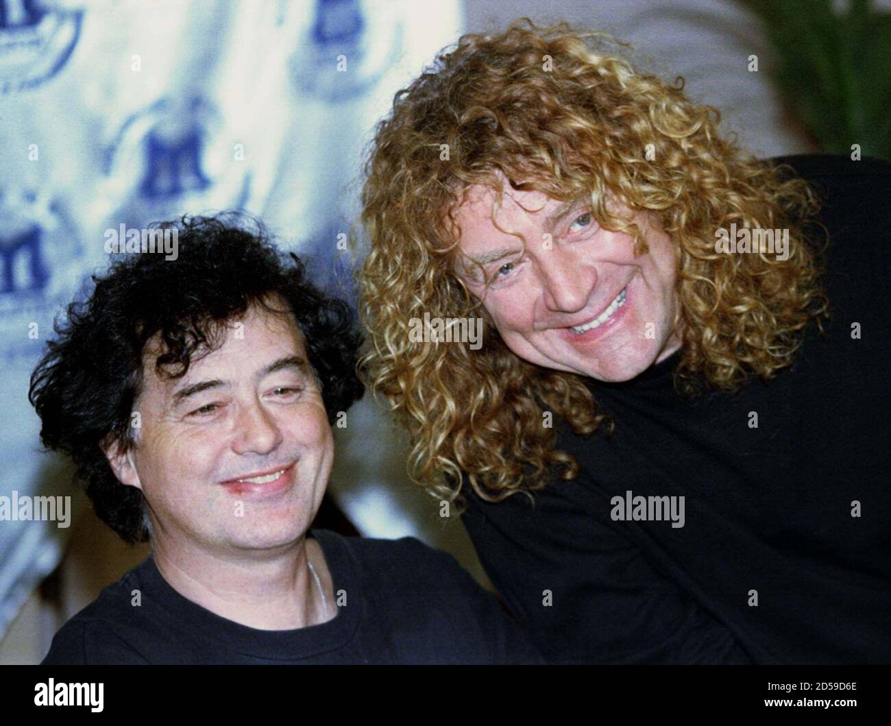 Rock legends Robert Plant (R) and Jimmy Page pose for photographers March 5  during a press conference in Istanbul. Led Zeppelin duo Jimmy Page and  Robert Plant are on a European tour,
