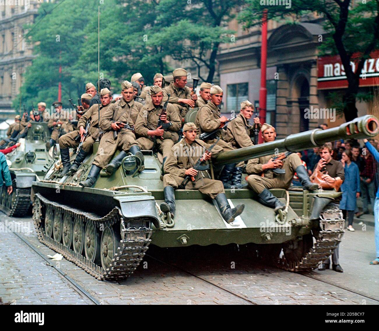soviet-army-soldiers-sit-on-their-tanks-in-front-of-the-czechoslovak-radio-station-building-in-central-prague-during-the-first-day-of-soviet-led-invasion-to-then-czechoslovakia-august-21-1968-vera-machutova-woke-one-august-night-in-1968-to-the-thunder-of-soviet-tanks-surging-through-this-czech-city-on-the-east-german-frontier-forty-years-later-with-the-czech-republic-now-a-democracy-within-nato-and-the-european-union-machutova-is-troubled-by-the-conflict-in-georgia-whose-army-was-routed-last-week-by-russian-forces-that-pushed-deep-inside-its-territory-picture-taken-august-21-1968-to-m-2d5bcy7.jpg
