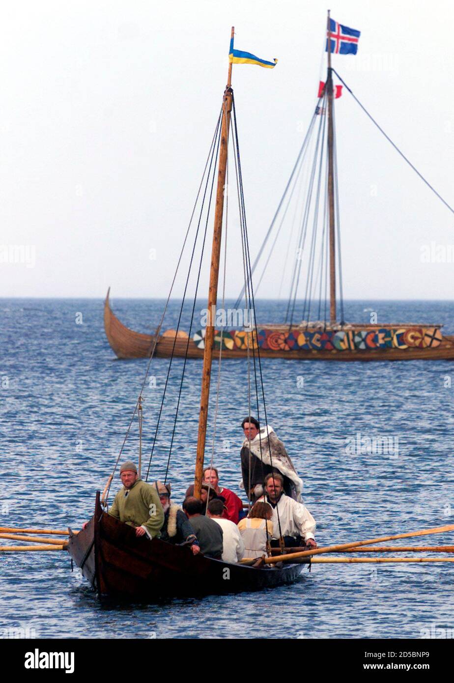The crew of the viking replica ship the Islendingur rows to shore in a