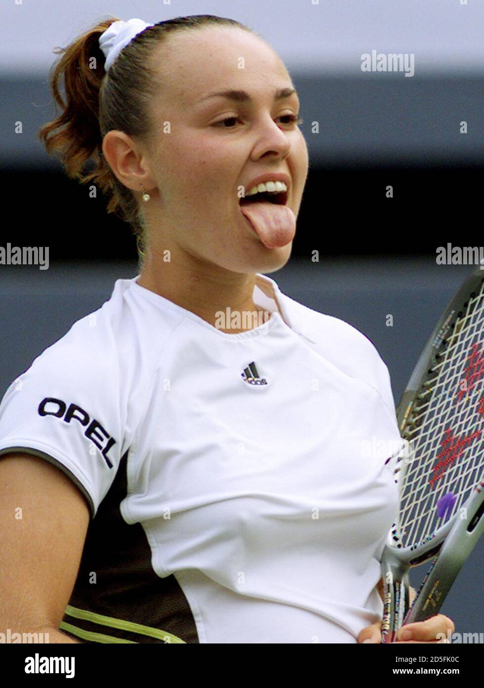 Martina Hingis of Switzerland sticks out her tongue after her win over [Anke  Huber of Germany] in their U.S. Open match in Flushing Meadows September 7.  Hingis won 6-2 6-0. **DIGITAL IMAGE**