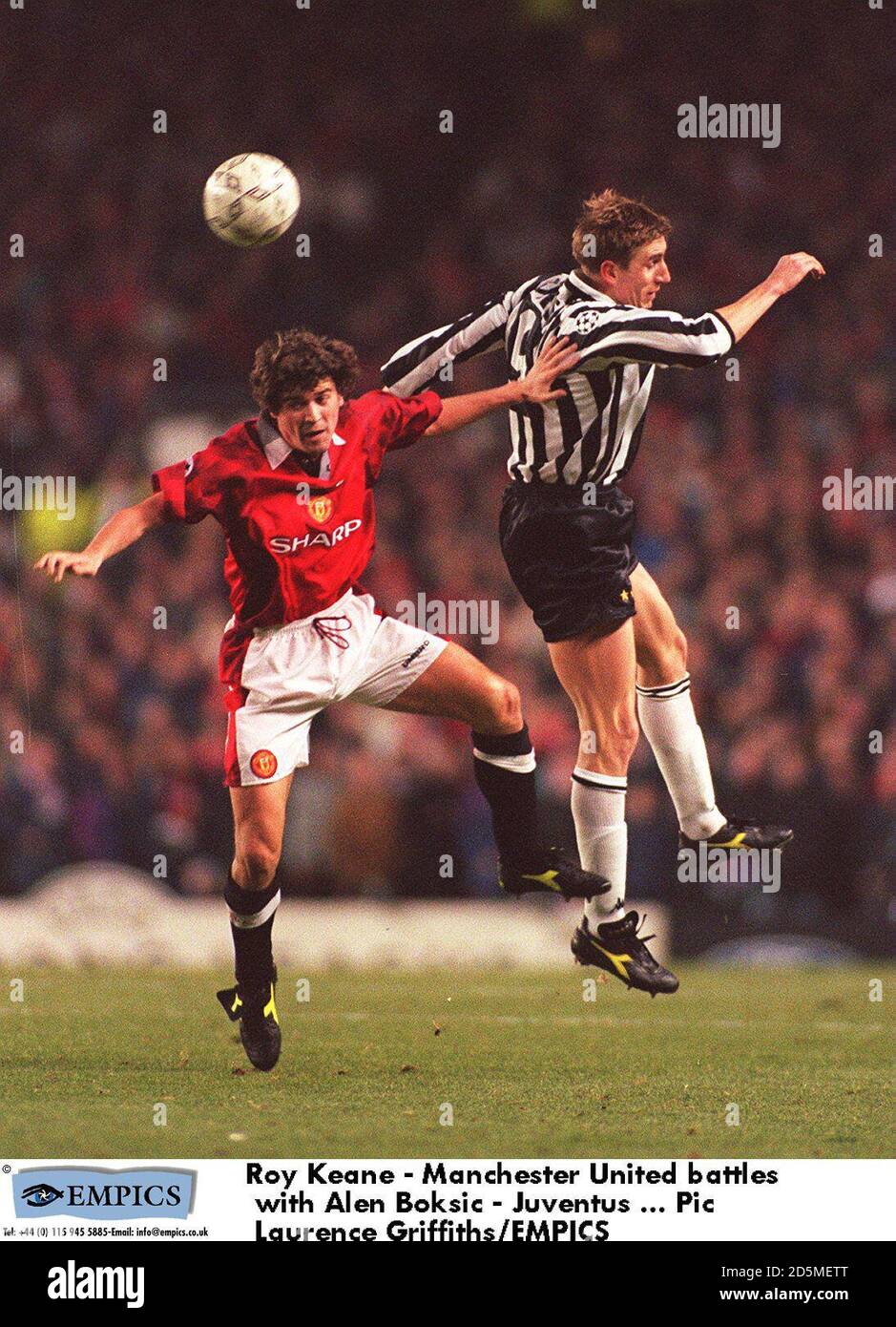 Roy Keane - Manchester United bataille avec Alen Boksic - Juventus Banque D'Images