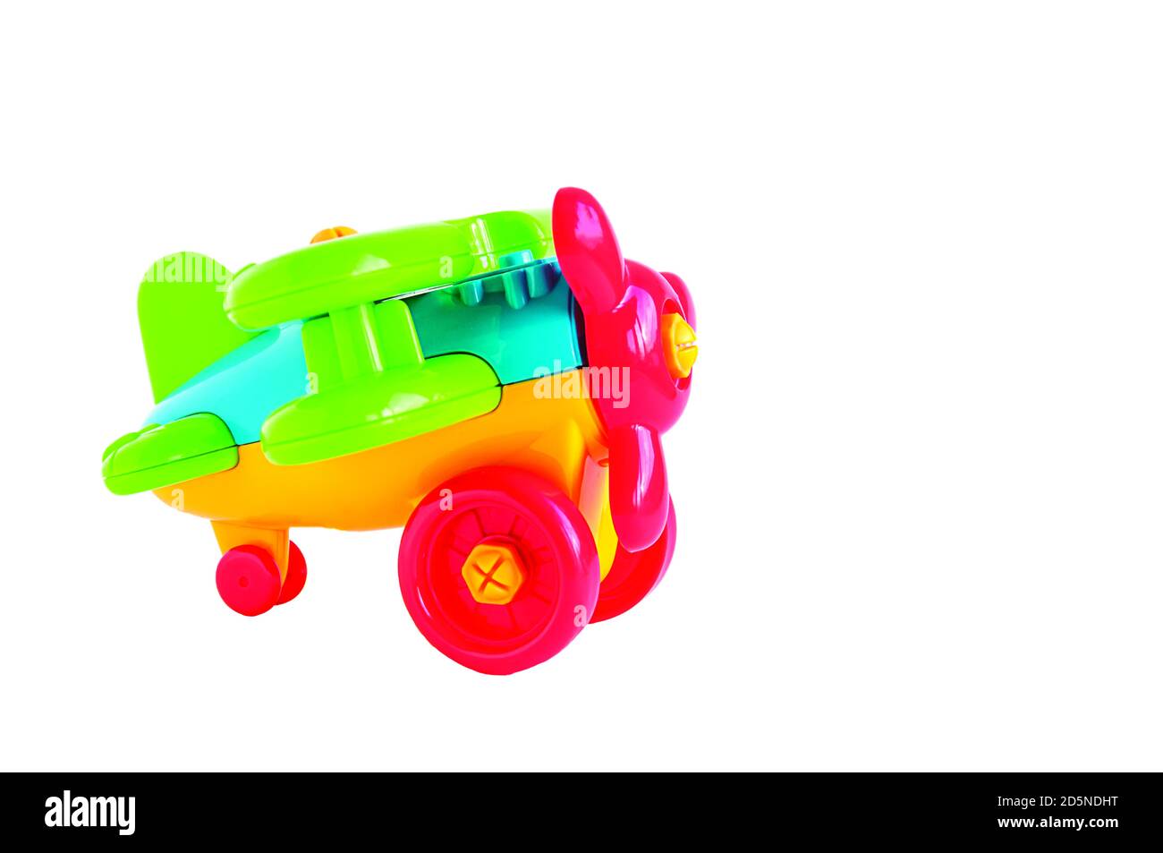 Avion jouet pour enfants SUR FOND BLANC, ORIENTATION HORIZONTALE, ISOLÉ Banque D'Images