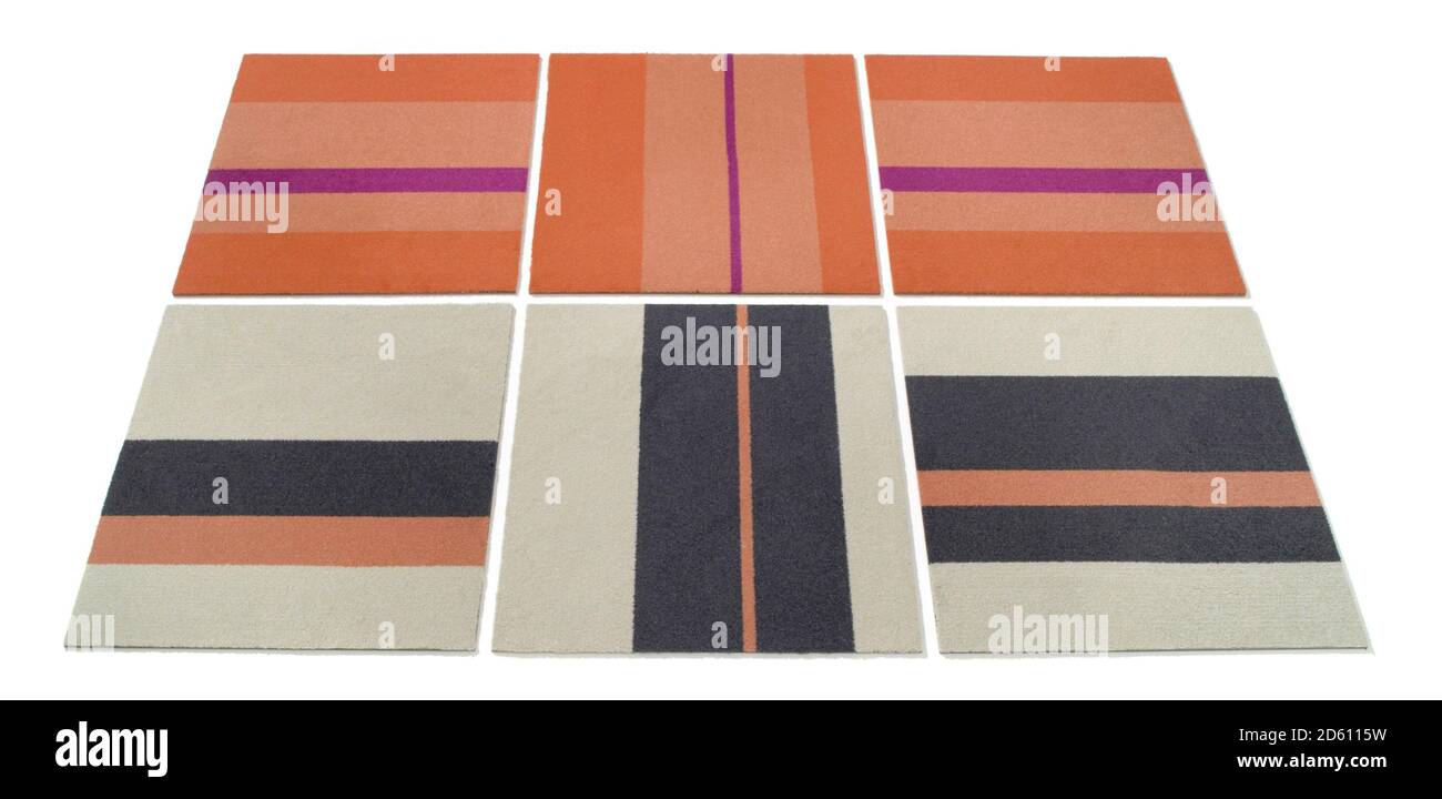 Carreaux de tapis à rayures multicolores photographiés sur un blanc arrière-plan Banque D'Images