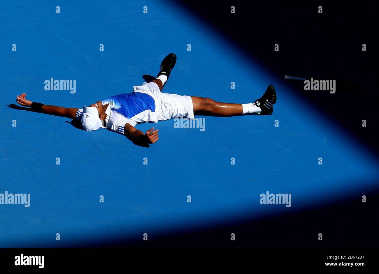 JO-Wilfried Tsonga célèbre sa victoire contre Andy Murray en Grande-Bretagne Au cours du 1er tour de l'Open d'Australie Banque D'Images