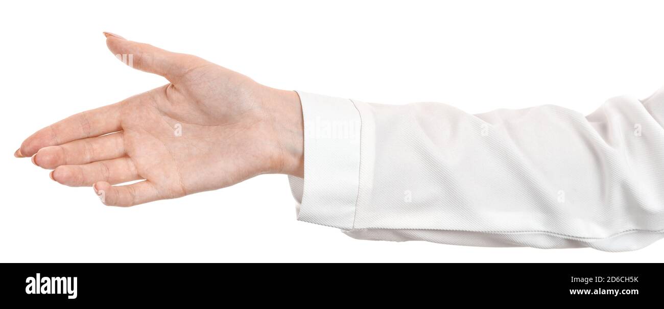 Les mains de race blanche dans un chemisier de bureau blanc, chemise isolée sur fond blanc montrant un geste de poignée de main. Bienvenue. Les mains de femme dans le bureau d'affaires Banque D'Images