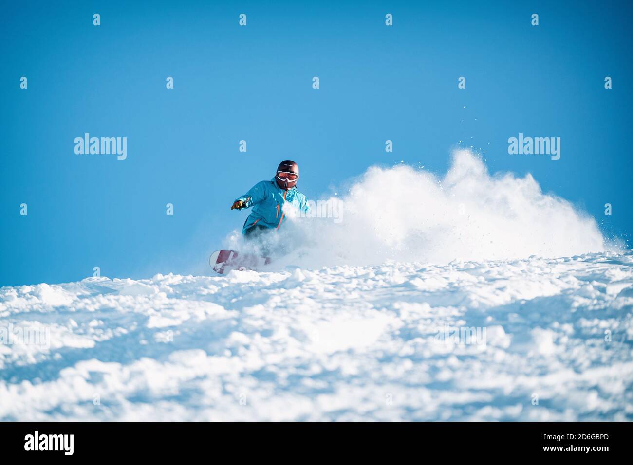 Poudreuse de freeride, snowboard dans la station des deux alpes en hiver, montagnes dans les alpes françaises, Rhône Alpes en France Europe Banque D'Images
