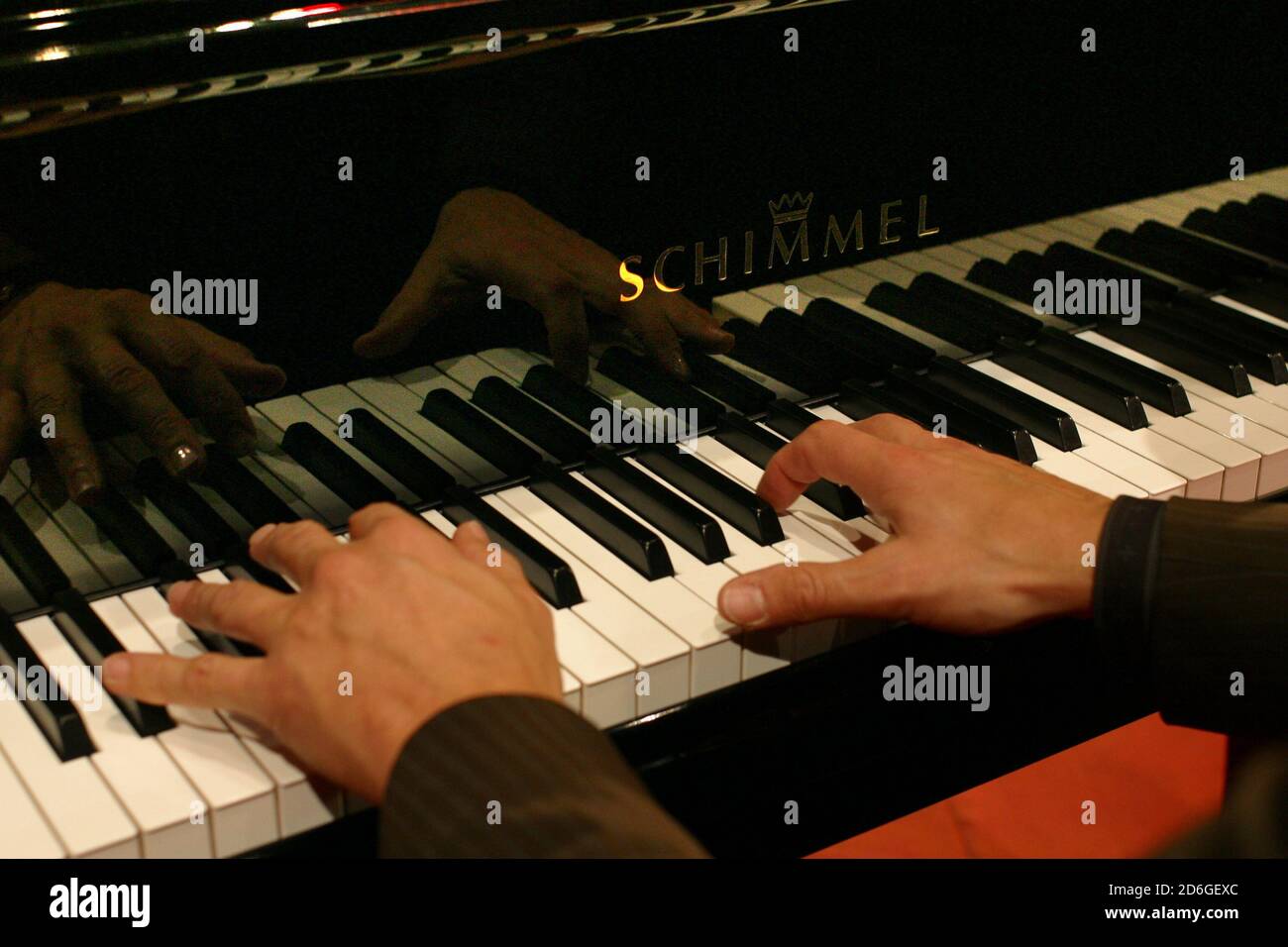 Niedersachsen , Braunschweig. Schimmel Pianofortefabrik. Haende spielen auf  dem Fluegel,Piano,Klavier. [©(c)Ingo Wandmacher, Paul-Gerhardt-Str.1, 236  Photo Stock - Alamy