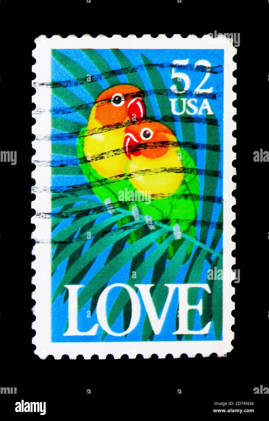 MOSCOU, RUSSIE - 24 NOVEMBRE 2017 : un timbre imprimé aux États-Unis montre le lovebird de Fischer (Agapornis fischeri), série Amour, vers 1991 Banque D'Images