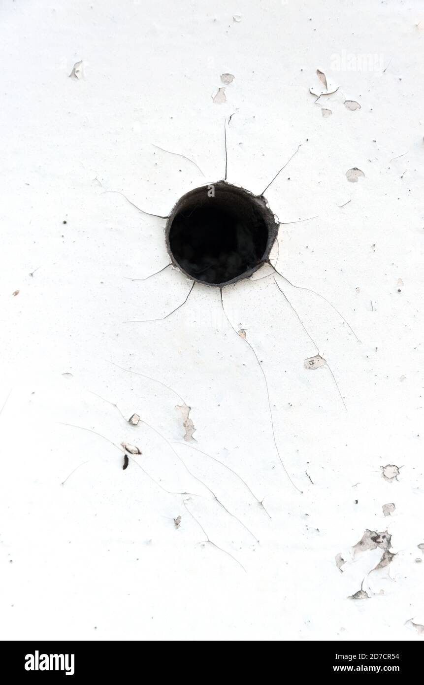 Trou noir dans le mur. Banque D'Images
