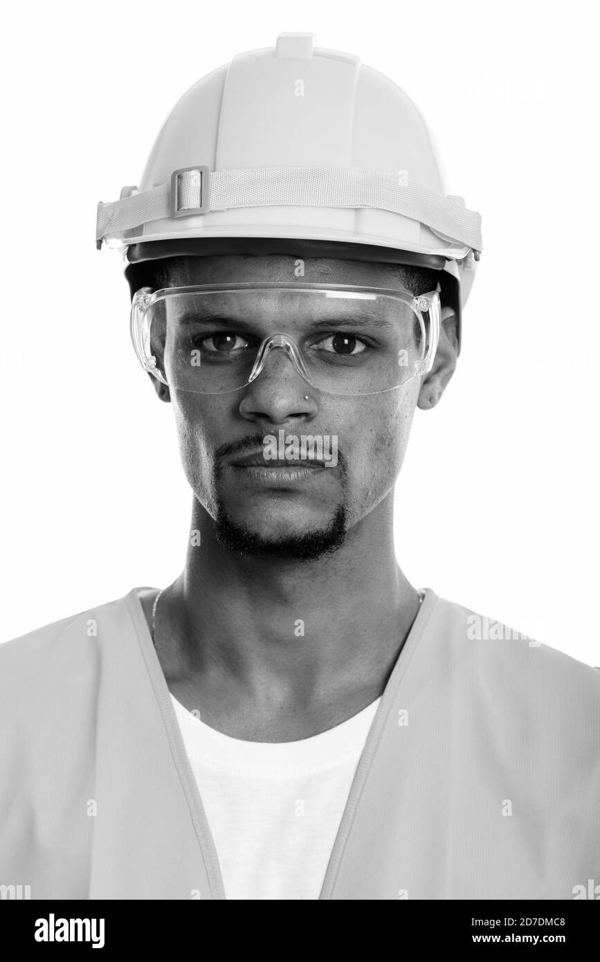 Visage de jeune homme africain construction worker wearing lunettes de protection Banque D'Images