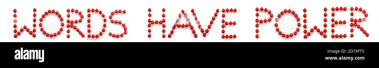 Boule de Noël rouge décoratif Bâtiment mots ont le pouvoir Banque D'Images
