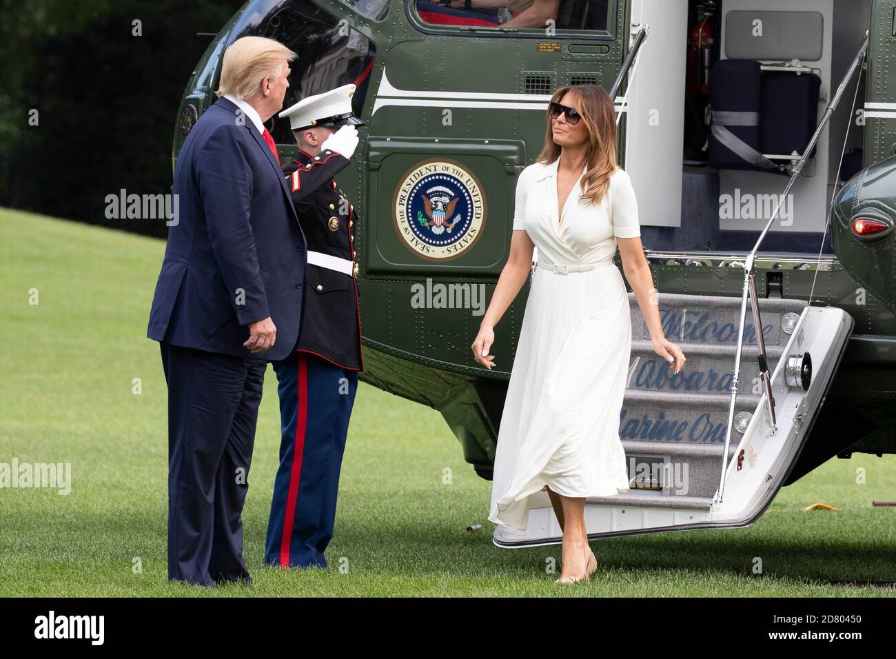 LE président AMÉRICAIN Donald Trump et la première dame Melania Trump arrivent à la Maison Blanche à bord de Marine One après un voyage d'un week-end à Bedminster, New Jersey, le 7 juillet 2019 à Washington, DC. Crédit : Alex Edelman/l'accès photo Banque D'Images
