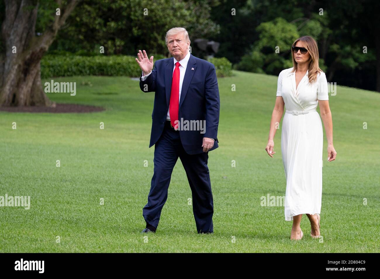 LE président AMÉRICAIN Donald Trump et la première dame Melania Trump arrivent à la Maison Blanche à bord de Marine One après un voyage d'un week-end à Bedminster, New Jersey, le 7 juillet 2019 à Washington, DC. Crédit : Alex Edelman/l'accès photo Banque D'Images