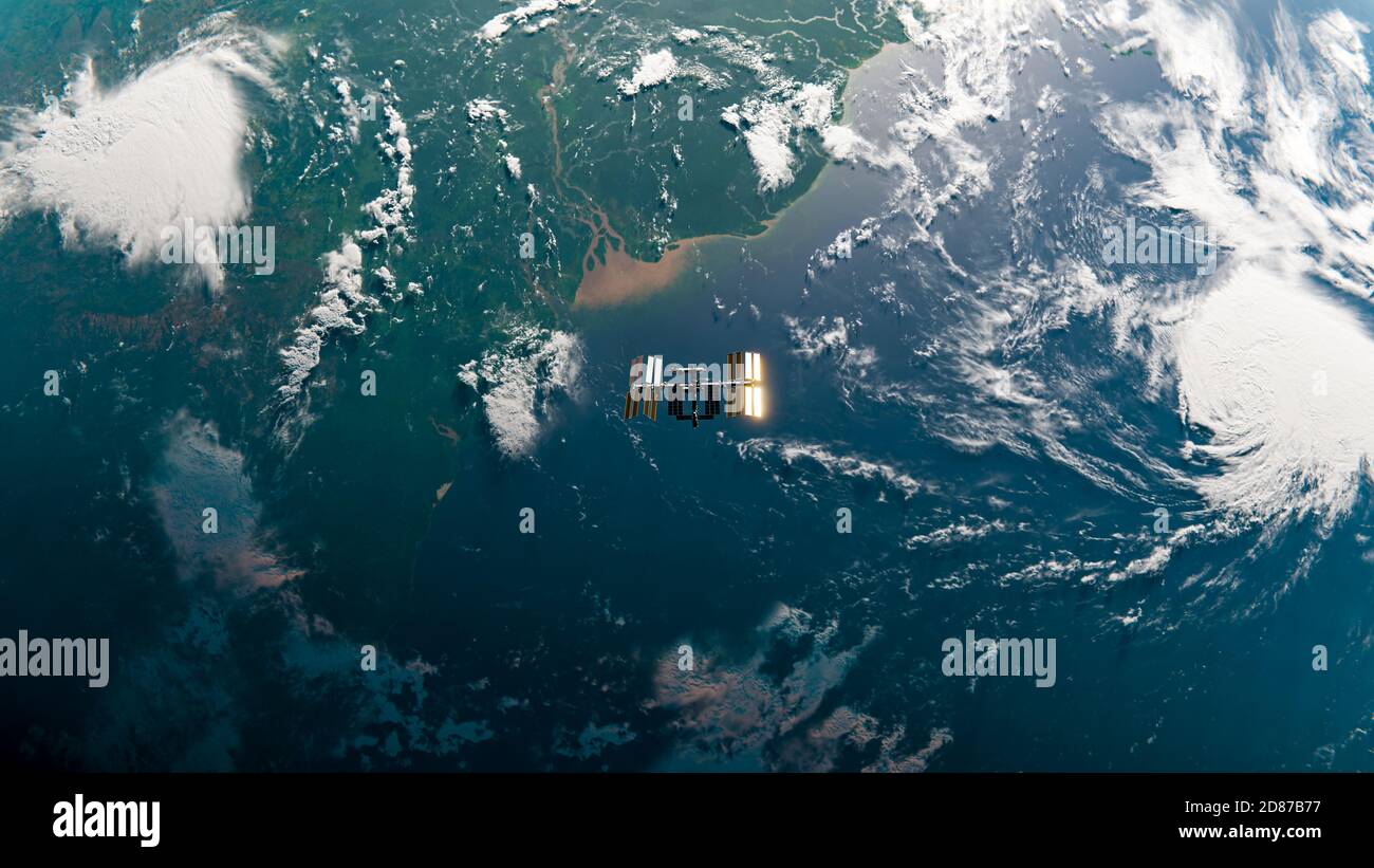 Station spatiale internationale (ISS) en orbite autour de la Terre au-dessus de la rivière Amazone Space Top Down View - SpaceX et NASA Research - Vue sur l'océan depuis le coucher du soleil Banque D'Images