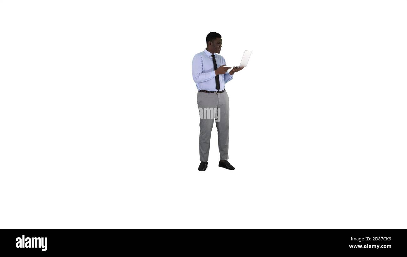 Joyeux et réussi jeune directeur afro-américain avec ordinateur portable h Banque D'Images