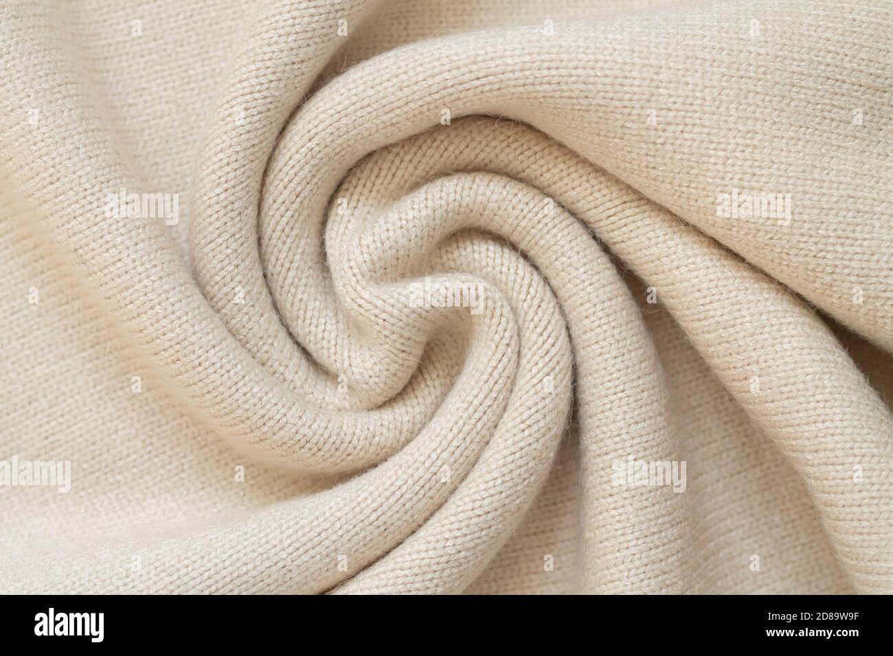 Arrière-plan du pull en laine beige chaud vue du dessus Banque D'Images