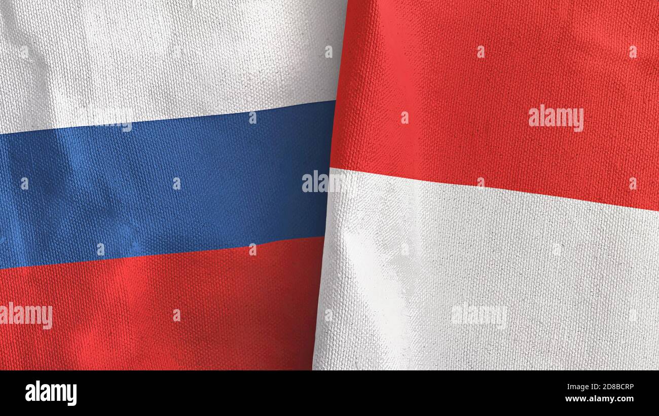 Indonésie et Russie deux drapeaux textile tissu rendu 3D Banque D'Images