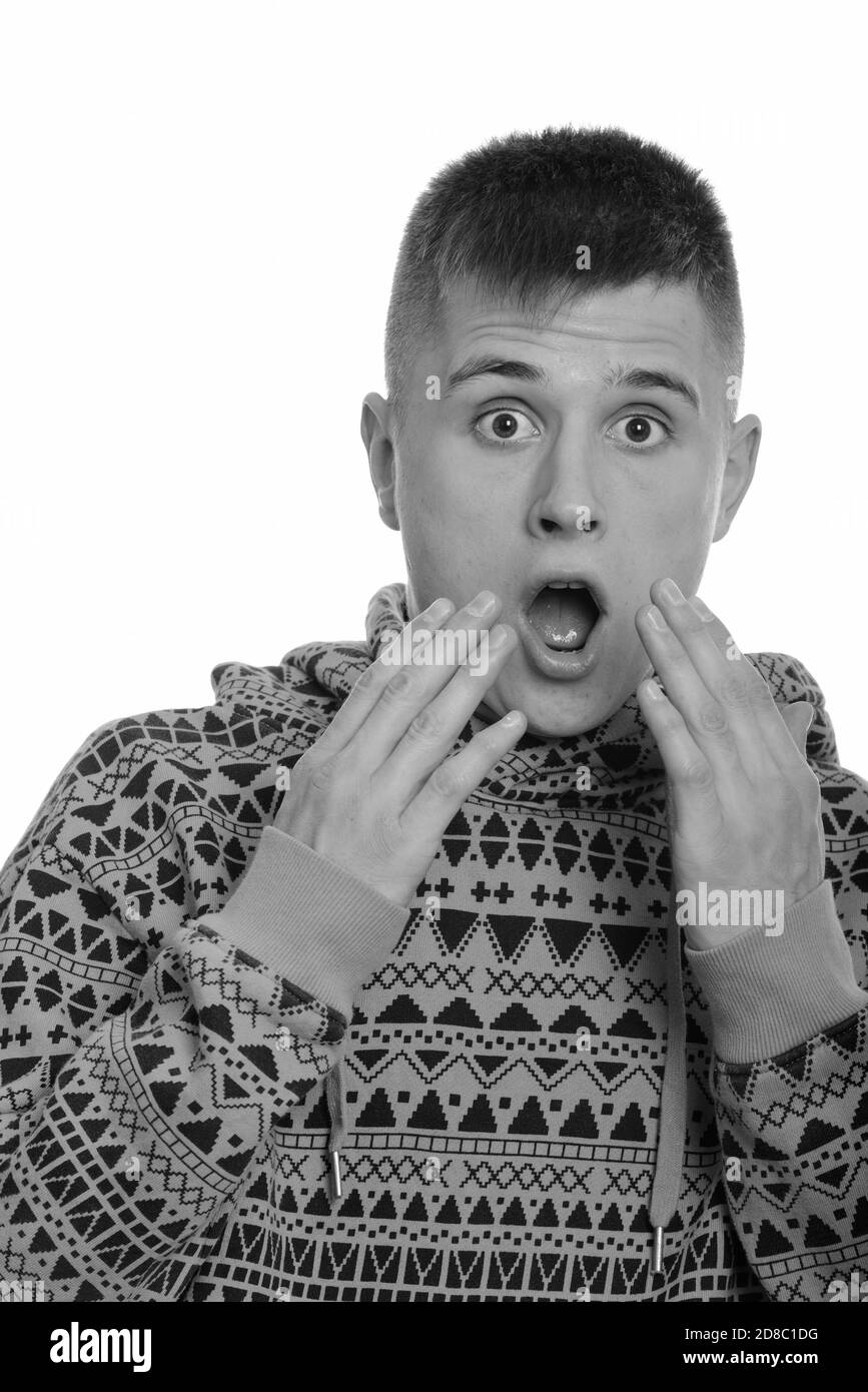 Visage d'un jeune homme caucasien qui a l'air surpris Banque D'Images