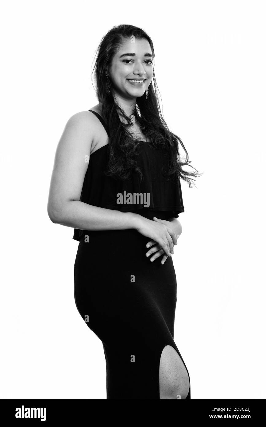 Young happy woman smiling while standing together Banque D'Images