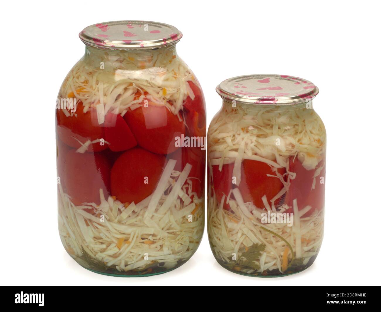 Tomates et chou en conserve et marinés dans un pot en verre. Légumes marinés faits maison. Banque D'Images