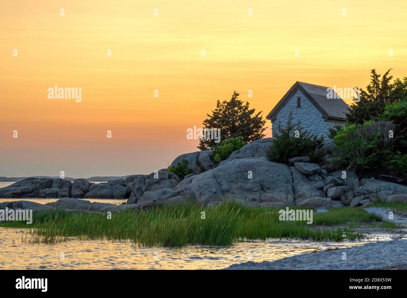 Couchers de soleil sur la plage de Gloucester Banque D'Images