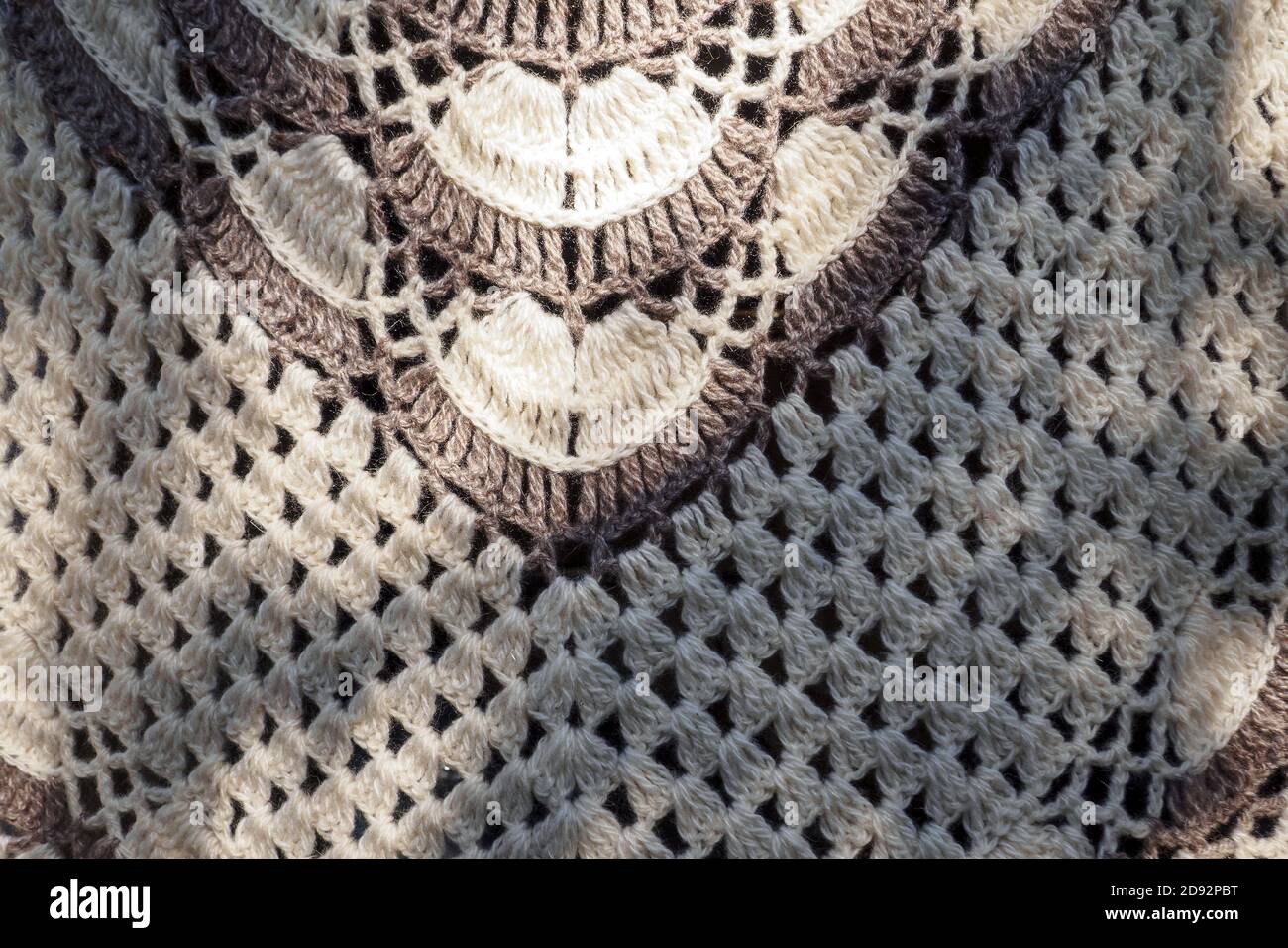 gros plan en laine de châle tricotée, arrière-plan texturé Banque D'Images