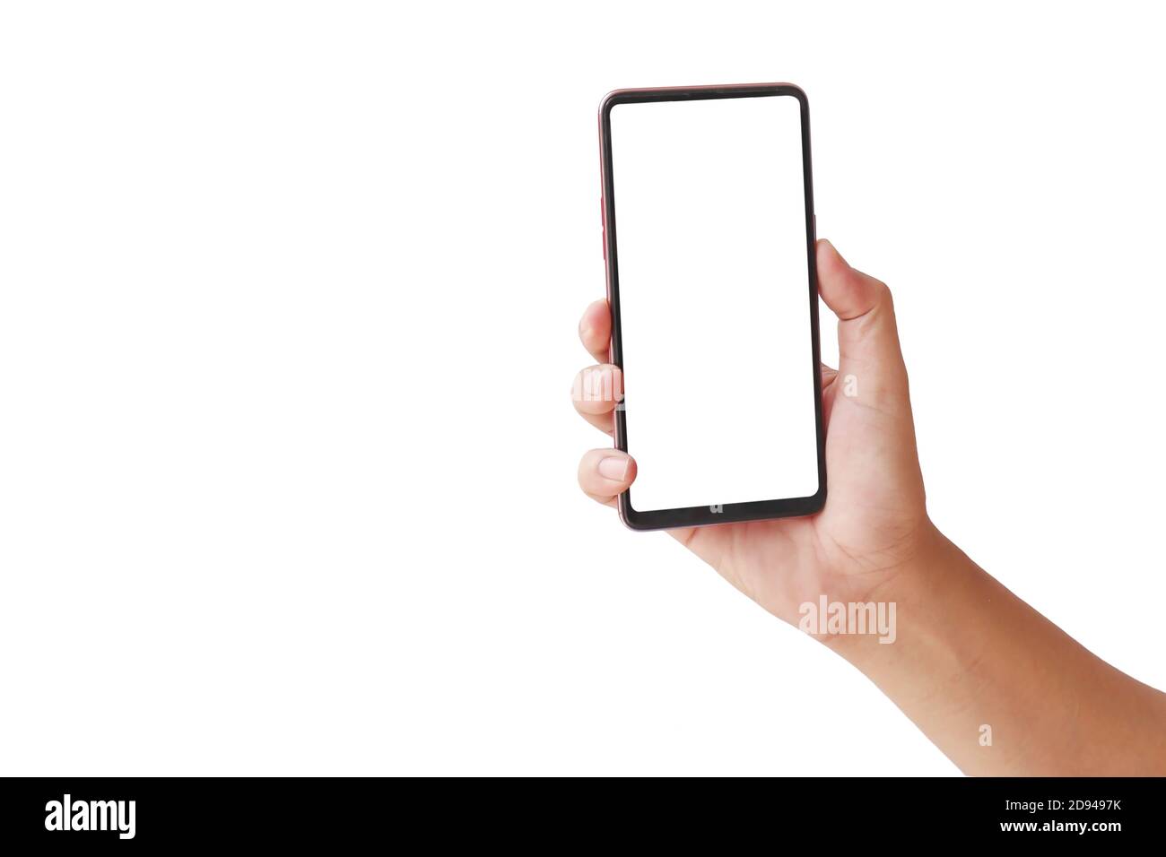 La main tient l'écran blanc, le téléphone portable est isolé sur un fond blanc avec le chemin de coupure. Banque D'Images
