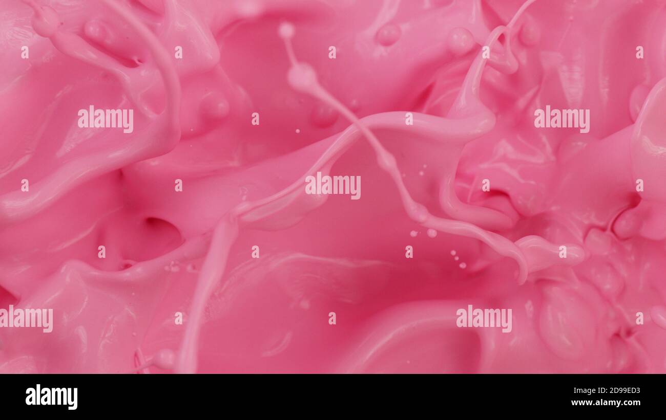 Taches de peinture roses, arrière-plan abstrait, mouvement de gel. Banque D'Images