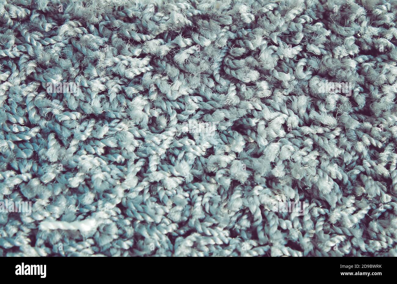 Fibres de tapis gros plan. Texture de tapis bleu, vue du dessus. Banque D'Images
