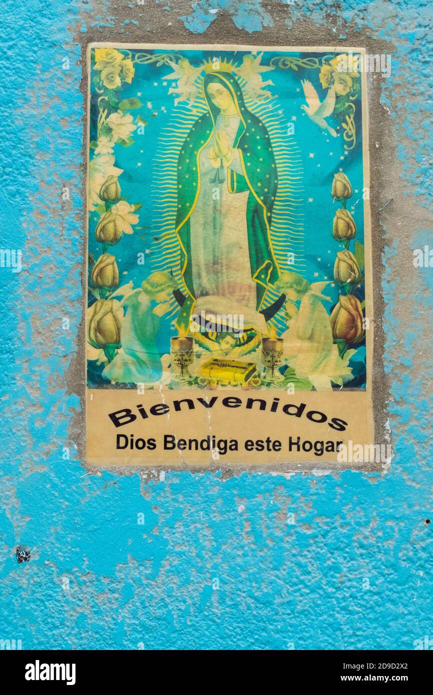 Peinture religieuse sur le mur d'une maison, Merira, Mexique Banque D'Images