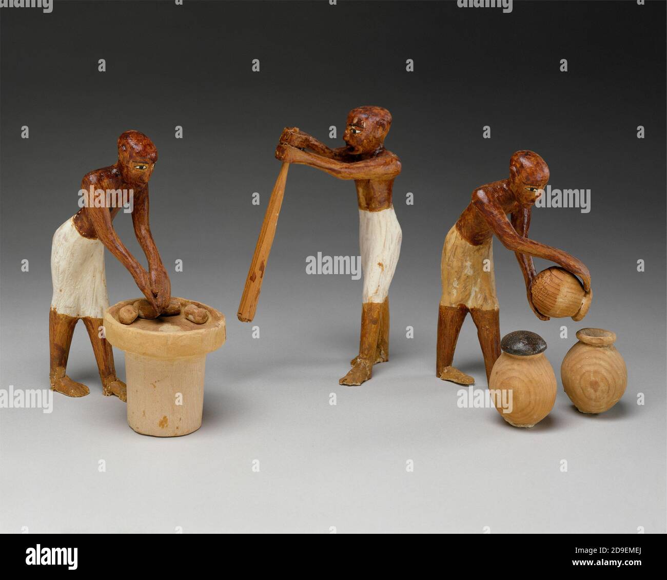 Les modèles de brasseur en bois d'un tombeau égyptien au milieu Royaume de THEMETMUSEUM À NYC Banque D'Images